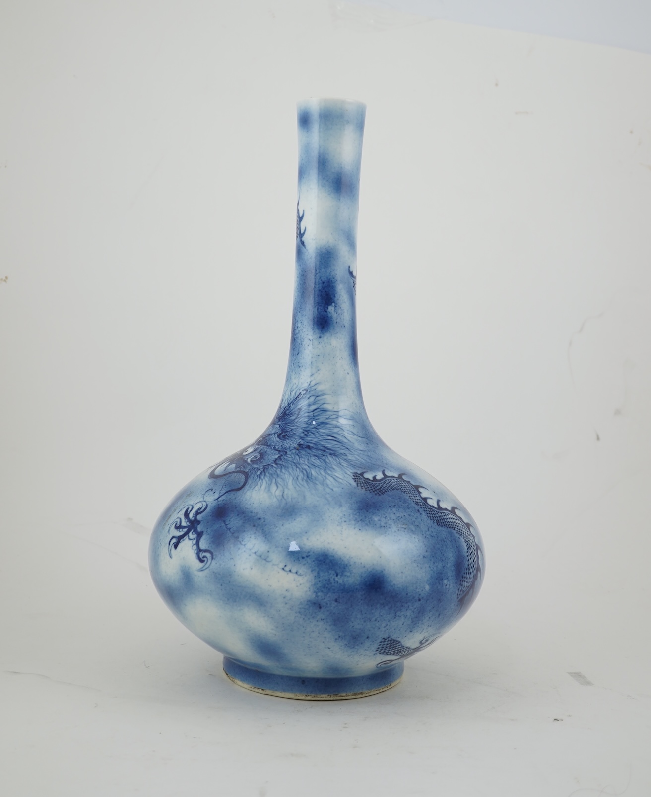 A Chinese blue and white ‘dragon’ bottle vase, 19th century